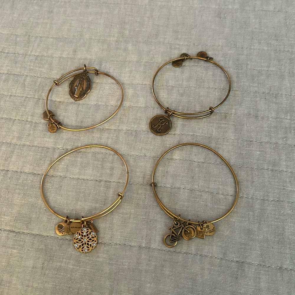 4 Alex and Ani bracelets. Sold as a set